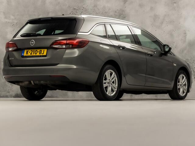 Opel ASTRA Sports Tourer 1.4 Turbo Innovation Sport 150Pk Automaat (APPLE CARPLAY, NAVIGATIE, CAMERA, STUUR/STOELVERWARMING, SPORTSTOELEN, ADAPTIVE CRUISE, LM VELGEN, NIEUWSTAAT)
