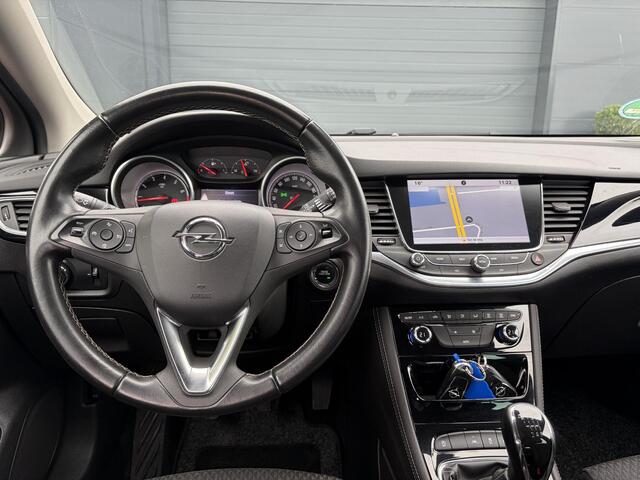 Opel ASTRA Sports Tourer 1.4 Innovation Dealer Onderhouden l 150pk l Carplay l 2e Eigenaar l Camera l Trekhaak l Keyless l Navi l Halfleder l Pdc V+A l 6 Bak l Clima l Cruise l Rijstrooksensor l Dodehoeksensor l N.A.P l Apk tot 01-2027