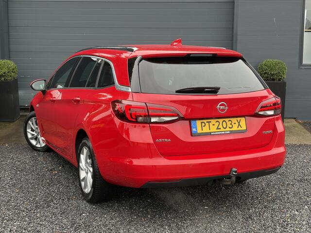 Opel ASTRA Sports Tourer 1.4 Innovation Dealer Onderhouden l 150pk l Carplay l 2e Eigenaar l Camera l Trekhaak l Keyless l Navi l Halfleder l Pdc V+A l 6 Bak l Clima l Cruise l Rijstrooksensor l Dodehoeksensor l N.A.P l Apk tot 01-2027