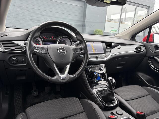 Opel ASTRA Sports Tourer 1.4 Innovation Dealer Onderhouden l 150pk l Carplay l 2e Eigenaar l Camera l Trekhaak l Keyless l Navi l Halfleder l Pdc V+A l 6 Bak l Clima l Cruise l Rijstrooksensor l Dodehoeksensor l N.A.P l Apk tot 01-2027
