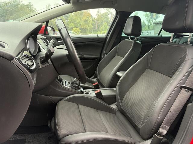 Opel ASTRA Sports Tourer 1.4 Innovation Dealer Onderhouden l 150pk l Carplay l 2e Eigenaar l Camera l Trekhaak l Keyless l Navi l Halfleder l Pdc V+A l 6 Bak l Clima l Cruise l Rijstrooksensor l Dodehoeksensor l N.A.P l Apk tot 01-2027