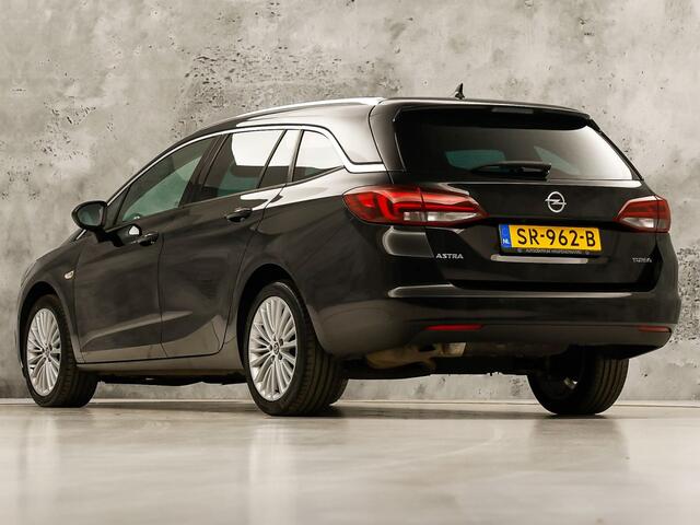 Opel ASTRA Sports Tourer 1.4 Innovation 150Pk (APPLE CARPLAY, GROOT NAVI, CLIMATE, CAMERA, SPORTSTOELEN, GETINT GLAS, ADAPTIVE CRUISE, KEYLESS, NIEUWSTAAT)