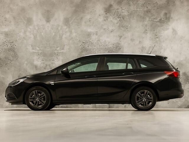 Opel ASTRA Sports Tourer 1.0 Turbo 120 Jaar Edition (APPLE CARPLAY, NAVIGATIE, LM VELGEN, PARKEERSENSOREN, SPORTSTOELEN, CRUISE, NIEUWE APK, NIEUWSTAAT)