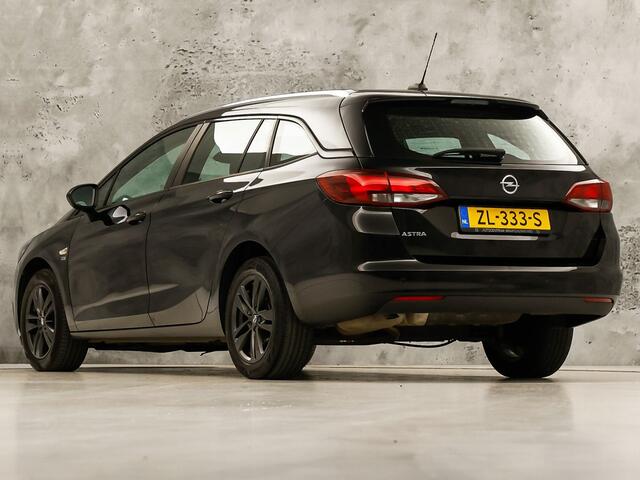 Opel ASTRA Sports Tourer 1.0 Turbo 120 Jaar Edition (APPLE CARPLAY, NAVIGATIE, LM VELGEN, PARKEERSENSOREN, SPORTSTOELEN, CRUISE, NIEUWE APK, NIEUWSTAAT)