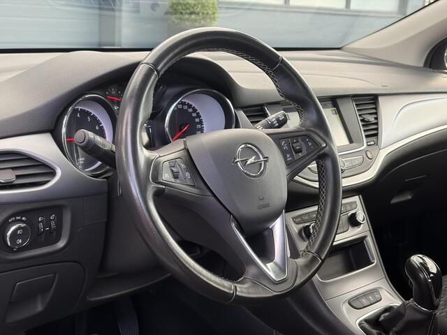 Opel ASTRA Sports Tourer 1.2 Edition ?Camera ?110pk?2e Eigenaar?Carplay?Navi?Airco?Cruise?Pdc?LED koplampen?N.A.P.?6 Bak?Pdc V+A?Lm velgen?Dakdragers ?Comfortstoelen?Bj 11-2020?Apk tot 07-2028