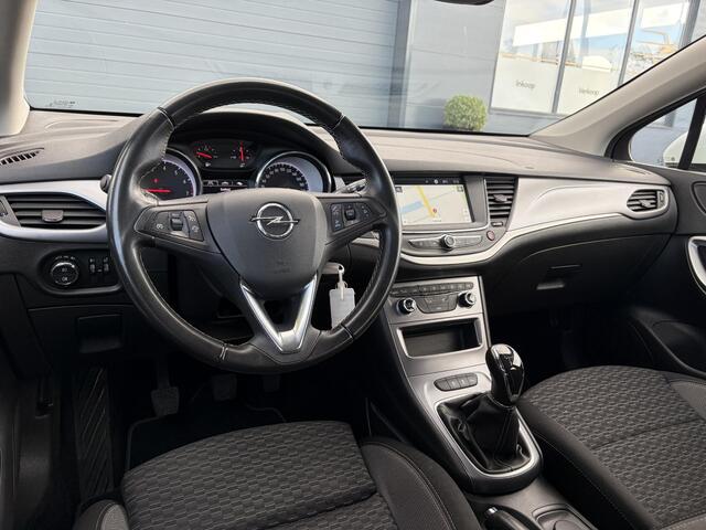 Opel ASTRA Sports Tourer 1.2 Edition ?Camera ?110pk?2e Eigenaar?Carplay?Navi?Airco?Cruise?Pdc?LED koplampen?N.A.P.?6 Bak?Pdc V+A?Lm velgen?Dakdragers ?Comfortstoelen?Bj 11-2020?Apk tot 07-2028