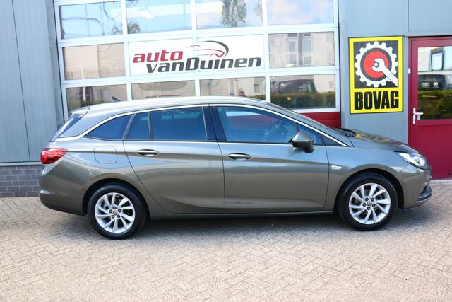 Opel ASTRA Sports Tourer 1.4 Turbo Innovation O.a: PDC, Camera, DAB, Clima, Navi, Cruise, Carplay, Etc. All-in prijs!