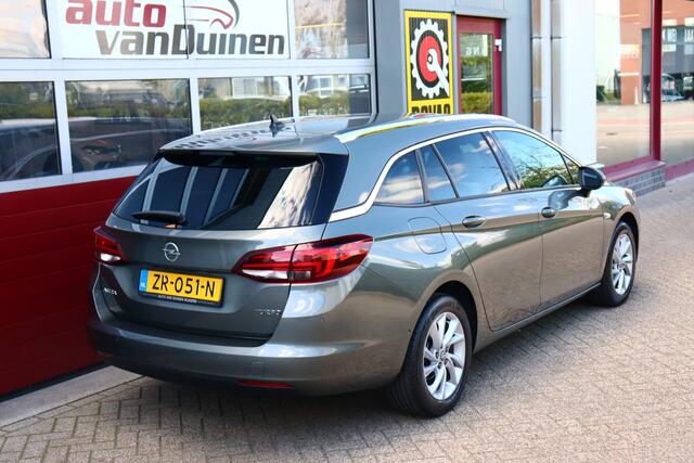 Opel ASTRA Sports Tourer 1.4 Turbo Innovation O.a: PDC, Camera, DAB, Clima, Navi, Cruise, Carplay, Etc. All-in prijs!