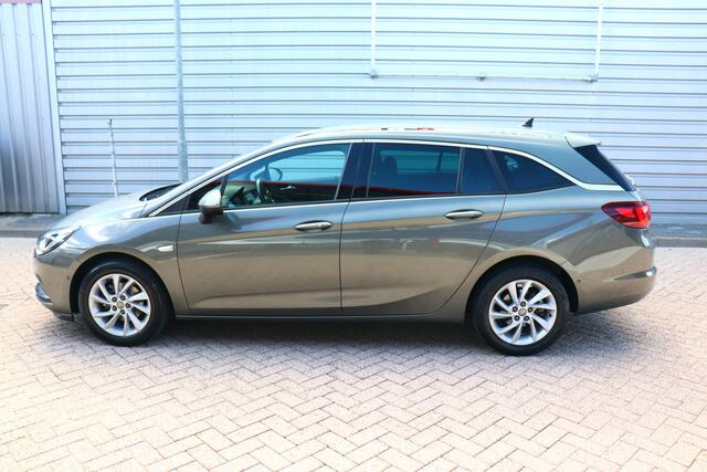 Opel ASTRA Sports Tourer 1.4 Turbo Innovation O.a: PDC, Camera, DAB, Clima, Navi, Cruise, Carplay, Etc. All-in prijs!