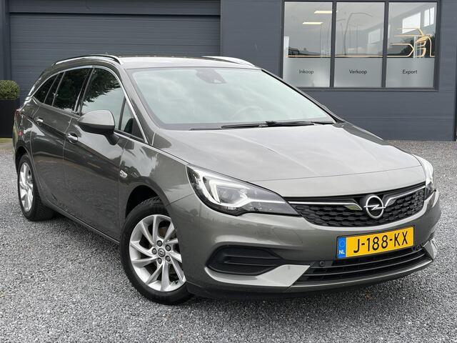 Opel ASTRA Sports Tourer 1.2 Elegance ?131pk?2e Eigenaar?Camera?Carplay?6 Bak?Stoelverw?Stuurverw?Pdc V+A?Recent beurt gehad?Clima?Cruise?Halfleder?Keyless?N.A.P?Lm velgen?Rijstrooksensor?Apk tot 09-2028