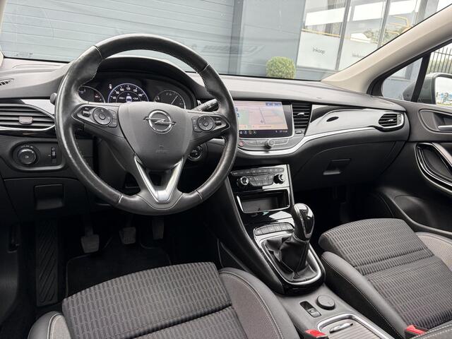 Opel ASTRA Sports Tourer 1.2 Elegance ?131pk?2e Eigenaar?Camera?Carplay?6 Bak?Stoelverw?Stuurverw?Pdc V+A?Recent beurt gehad?Clima?Cruise?Halfleder?Keyless?N.A.P?Lm velgen?Rijstrooksensor?Apk tot 09-2028