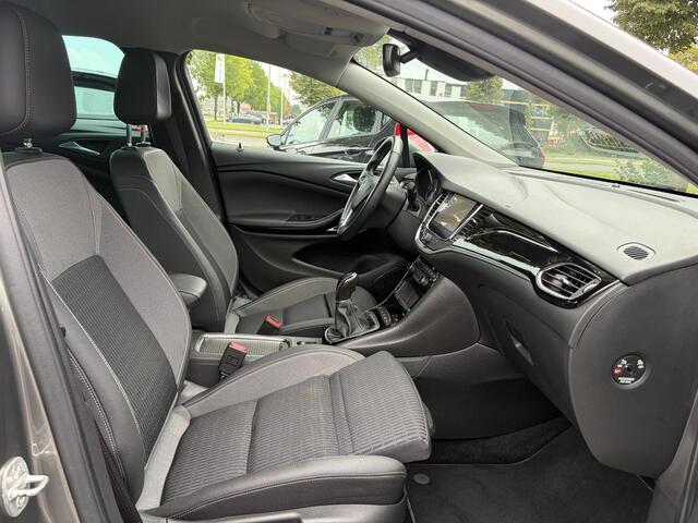 Opel ASTRA Sports Tourer 1.2 Elegance ?131pk?2e Eigenaar?Camera?Carplay?6 Bak?Stoelverw?Stuurverw?Pdc V+A?Recent beurt gehad?Clima?Cruise?Halfleder?Keyless?N.A.P?Lm velgen?Rijstrooksensor?Apk tot 09-2028