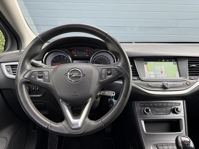 Opel ASTRA Sports Tourer 1.2 Business Executive ?1e Eigenaar?146pk?Camera?Trekhaak?Carplay?Airco?Cruise?Pdc V+A?Lm velgen?Comfortstoelen?6 Bak?N.A.P?Nieuwe Apk bij Aflevering