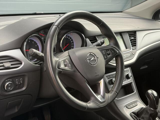 Opel ASTRA Sports Tourer 1.2 Business Executive ?1e Eigenaar?146pk?Camera?Trekhaak?Carplay?Airco?Cruise?Pdc V+A?Lm velgen?Comfortstoelen?6 Bak?N.A.P?Nieuwe Apk bij Aflevering
