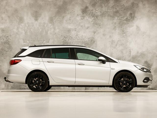 Opel ASTRA Sports Tourer 1.2 Ultimate 145Pk (VIRTUAL COCKPIT, APPLE CARPLAY, GROOT NAVI, CAMERA, LEDER/ALCANTARA, SPORTSTOELEN, TREKHAAK, ZWART HEMEL, ADAPTIVE CRUISE, NIEUWSTAAT)