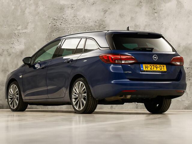 Opel ASTRA Sports Tourer 1.2 Launch Sport (VIRTUAL COCKPIT, APPLE CARPLAY, GROOT NAVI, CAMERA, STUUR/STOELVERWARMING, SPORTSTOELEN, GETINT GLAS, ADAPTIVE CRUISE, ZWART HEMEL, NIEUWSTAAT)