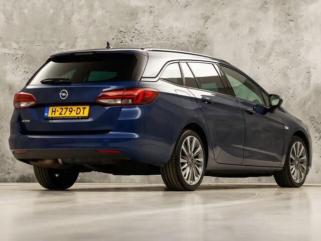 Opel ASTRA Sports Tourer 1.2 Launch Sport (VIRTUAL COCKPIT, APPLE CARPLAY, GROOT NAVI, CAMERA, STUUR/STOELVERWARMING, SPORTSTOELEN, GETINT GLAS, ADAPTIVE CRUISE, ZWART HEMEL, NIEUWSTAAT)