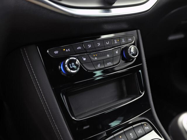 Opel ASTRA Sports Tourer 1.2 Launch Sport (VIRTUAL COCKPIT, APPLE CARPLAY, GROOT NAVI, CAMERA, STUUR/STOELVERWARMING, SPORTSTOELEN, GETINT GLAS, ADAPTIVE CRUISE, ZWART HEMEL, NIEUWSTAAT)