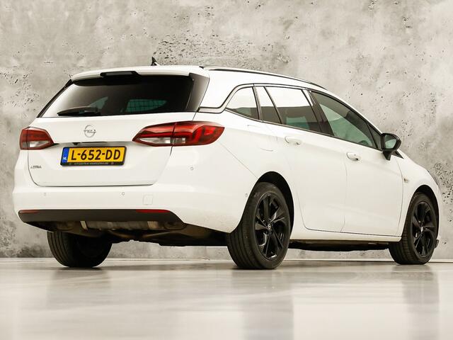 Opel ASTRA Sports Tourer 1.4 Ultimate 145Pk Automaat (VIRTUAL COCKPIT, APPLE CARPLAY, GROOT NAVI, LEDER/ALCANTARA, CAMERA, SPORTSTOELEN, GETINT GLAS, ZWART HEMEL, ADAPTIVE CRUISE, NIEUWSTAAT)