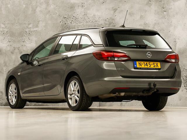 Opel ASTRA Sports Tourer 1.2 Sport (APPLE CARPLAY, NAVIGATIE, CRUISE, TREKHAAK, SPORTSTOELEN, PARKEERSENSOREN, NIEUWSTAAT)