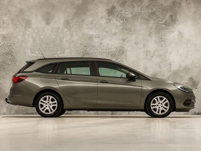 Opel ASTRA Sports Tourer 1.2 Sport (APPLE CARPLAY, NAVIGATIE, CRUISE, TREKHAAK, SPORTSTOELEN, PARKEERSENSOREN, NIEUWSTAAT)