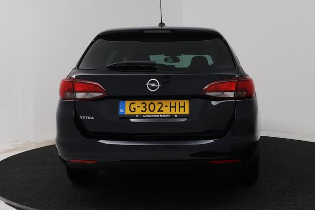 Opel ASTRA Sports Tourer 1.4 Turbo 120 Jaar Edition (NAVIGATIE, CRUISE CONTROL, PARKEERSENSOREN)