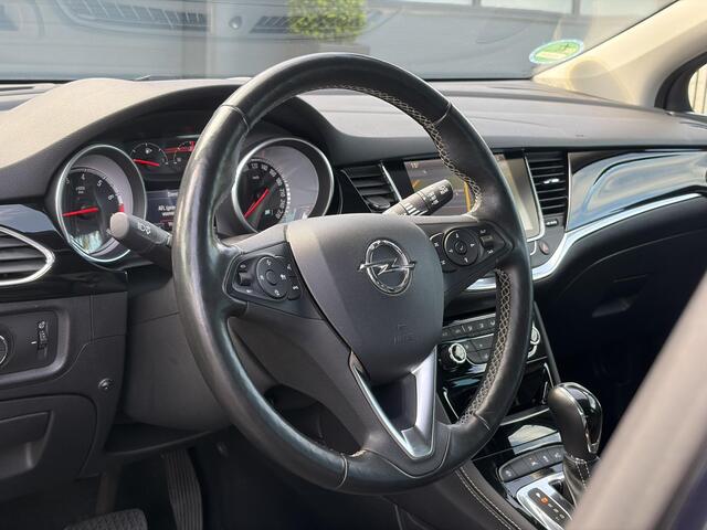 Opel ASTRA Sports Tourer 1.4 Business Executive ?2 Eigenaar?Camera?Navi?Trekhaakt?Carplay?Stoelverw?Stuurverw?Automaat?Dealer Onderhouden?Keyless?Clima?Cruise?Pdc V+A?Halfleder?Comfortstoelen?150pk?Rijstrooksensor?Dodehoeksensor?Elekt Stoelen?Lm velgen?N.A.P?Apk tot 03-2027