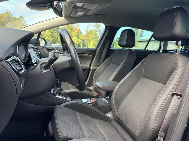Opel ASTRA Sports Tourer 1.4 Business Executive ?2 Eigenaar?Camera?Navi?Trekhaakt?Carplay?Stoelverw?Stuurverw?Automaat?Dealer Onderhouden?Keyless?Clima?Cruise?Pdc V+A?Halfleder?Comfortstoelen?150pk?Rijstrooksensor?Dodehoeksensor?Elekt Stoelen?Lm velgen?N.A.P?Apk tot 03-2027