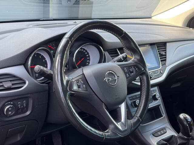 Opel ASTRA Sports Tourer 1.4 Turbo Online Edition ?150pk?2e Eigenaar?Camera?Carplay?Navi?Pdc V+A?Stoelverw?Stuurverw?Clima?Cruise?Lm velgen?6 Bak?Comfortstoelen?Dealer Onderhouden?N.A.P?Bj 12-2018?Apk tot 01-2027