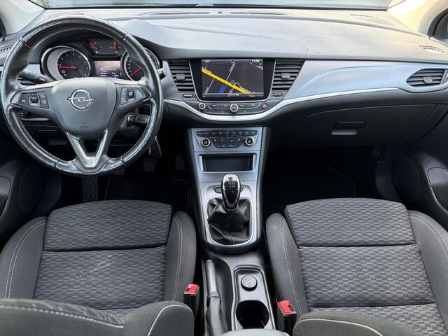 Opel ASTRA Sports Tourer 1.4 Turbo Online Edition ?150pk?2e Eigenaar?Camera?Carplay?Navi?Pdc V+A?Stoelverw?Stuurverw?Clima?Cruise?Lm velgen?6 Bak?Comfortstoelen?Dealer Onderhouden?N.A.P?Bj 12-2018?Apk tot 01-2027