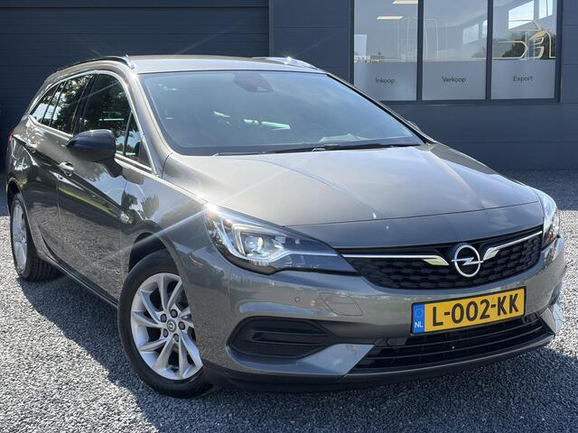 Opel ASTRA Sports Tourer 1.2 Business Elegance ?1e Eigenaar?110pk?Carplay?Camera?Navi?Clima?Cruise?Halfleder?Comfortstoel?Pdc V+A?6 Bak?Dealer Onderhouden?Keyless?Lm velgen?N.A.P?Apk tot 06-2027
