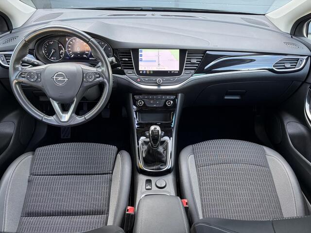 Opel ASTRA Sports Tourer 1.2 Business Elegance ?1e Eigenaar?110pk?Carplay?Camera?Navi?Clima?Cruise?Halfleder?Comfortstoel?Pdc V+A?6 Bak?Dealer Onderhouden?Keyless?Lm velgen?N.A.P?Apk tot 06-2027