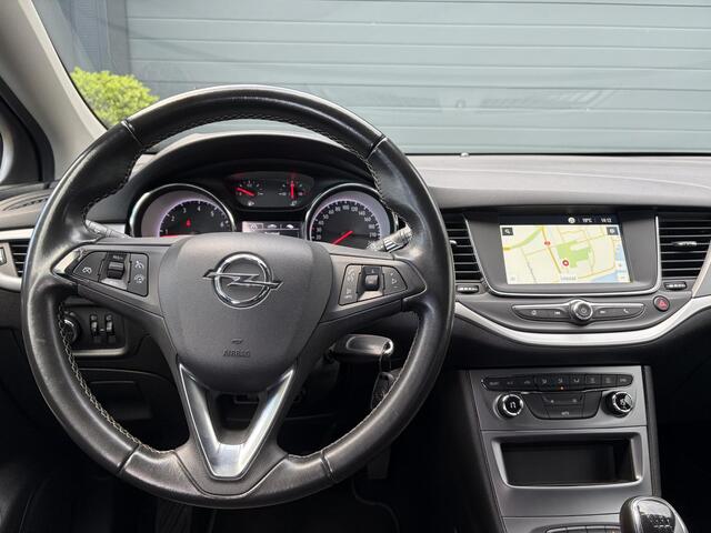 Opel ASTRA Sports Tourer 1.4 Turbo 120 Jaar Edition ?150pk?Carplay?Navi?Trekhaak?Pdc V+A?Clima?Cruise?6 Bak?Lm velgen?N.A.P?Apk tot 02-2028