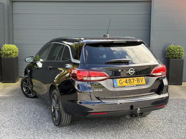 Opel ASTRA Sports Tourer 1.4 Turbo 120 Jaar Edition ?150pk?Carplay?Navi?Trekhaak?Pdc V+A?Clima?Cruise?6 Bak?Lm velgen?N.A.P?Apk tot 02-2028