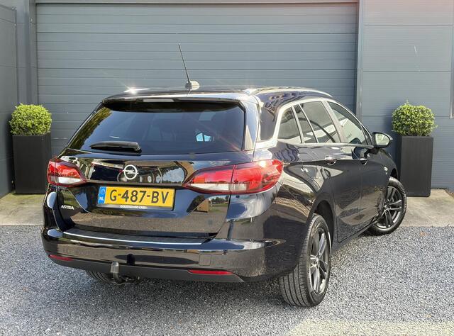 Opel ASTRA Sports Tourer 1.4 Turbo 120 Jaar Edition ?150pk?Carplay?Navi?Trekhaak?Pdc V+A?Clima?Cruise?6 Bak?Lm velgen?N.A.P?Apk tot 02-2028