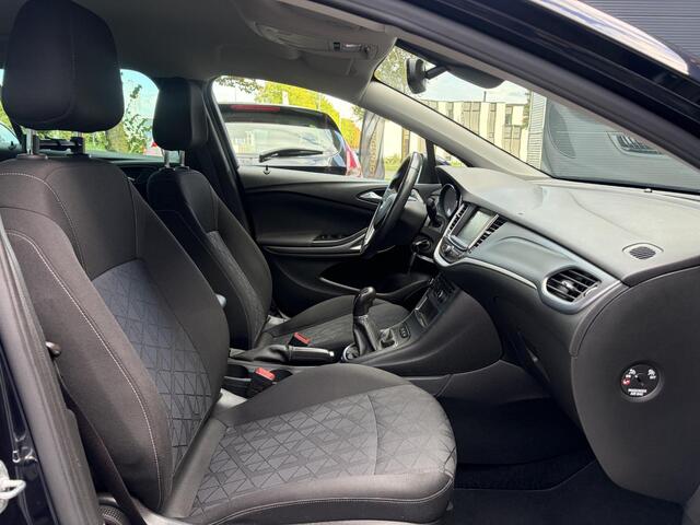 Opel ASTRA Sports Tourer 1.4 Turbo 120 Jaar Edition ?150pk?Carplay?Navi?Trekhaak?Pdc V+A?Clima?Cruise?6 Bak?Lm velgen?N.A.P?Apk tot 02-2028