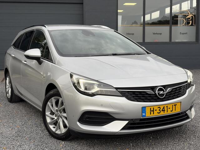 Opel ASTRA Sports Tourer 1.2 Elegance ?110pk?Camera?Carplay?Navi?Halfleder?Keyless?Trekhaak?Pdc V+A?Clima?Cruise?Elekt Stoel?Recent beurt gehad?Dodehoeksensor?Rijstrooksensor?Lm velgen?N.A.P?Apk tot 11-2027 – foto 2