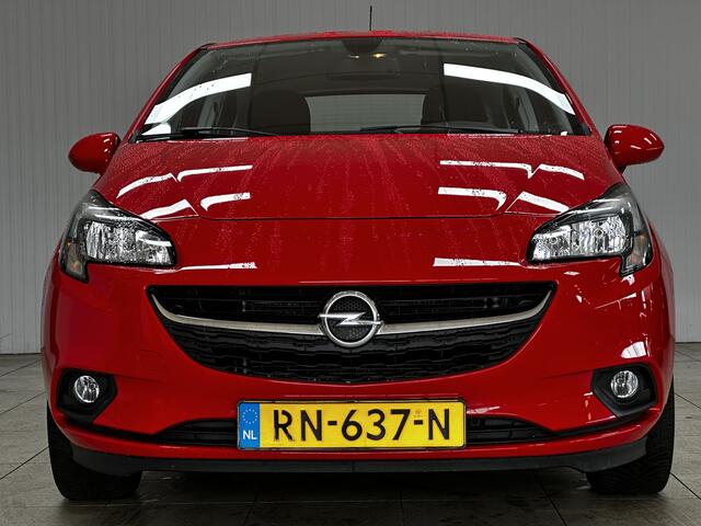 Opel CORSA 1.4 Favourite/ Trekhaak/ 16'' LMV/ Apple + Android/ DAB+/ Navi/ Airco/ Cruise/ Elek. pakket/ Isofix/ Bluetooth/ Multi. LEDER. Stuur/ Mistl./ PDC.