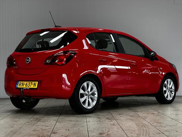 Opel CORSA 1.4 Favourite/ Trekhaak/ 16'' LMV/ Apple + Android/ DAB+/ Navi/ Airco/ Cruise/ Elek. pakket/ Isofix/ Bluetooth/ Multi. LEDER. Stuur/ Mistl./ PDC.