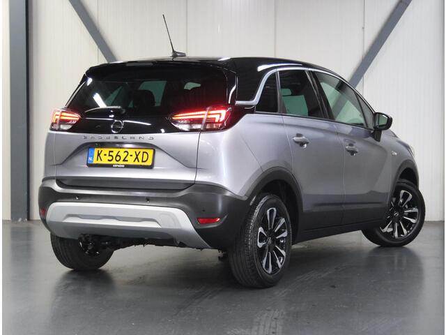 Opel Crossland 110PK Elegance | 1ste eigenaar | Camera | AppleCarplay/AndroidAuto | Navigatie | LED lampen | LEER/Stof | Climate Control | Cruise Control | Isofix | Privacy Glass | Parkeersensoren | Two-Tone |