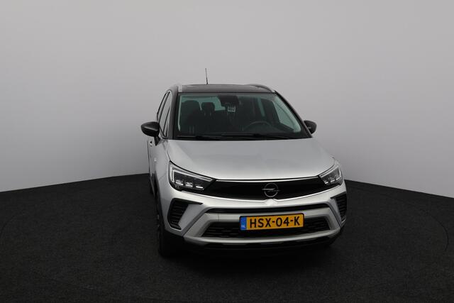 Opel Crossland 1.2 Turbo Level 4/ Two-Tone/ Trekhaak/ 16'' LMV/ Apple + Android/ Dode-Hoek DET./ Lane-Assist./ LED koplampen/ Camera/ Extra getint glas/ Cruise/ Multi. LEDER. Stuur.