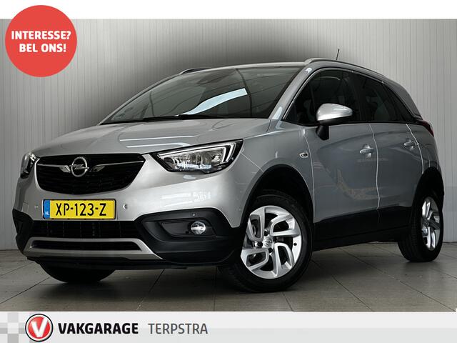 Opel Crossland X 1.2 Turbo Innovation/ D-Riem verv: 63.000 KM!/ 111pk!/ Keyless/ Lane-Assist./ Apple + Android/ DAB+/ Navi/ Comfort-Stoelen/ 16'' LMV/ Camera/ Clima/ Cruise/ Multi. LEDER. Stuur/ Mistl./ PDC V+A/ Chroom/ LED Dagrij