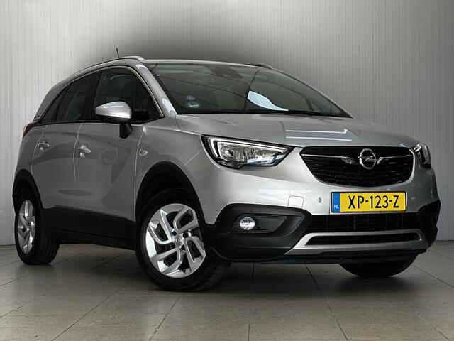 Opel Crossland X 1.2 Turbo Innovation/ D-Riem verv: 63.000 KM!/ 111pk!/ Keyless/ Lane-Assist./ Apple + Android/ DAB+/ Navi/ Comfort-Stoelen/ 16'' LMV/ Camera/ Clima/ Cruise/ Multi. LEDER. Stuur/ Mistl./ PDC V+A/ Chroom/ LED Dagrij