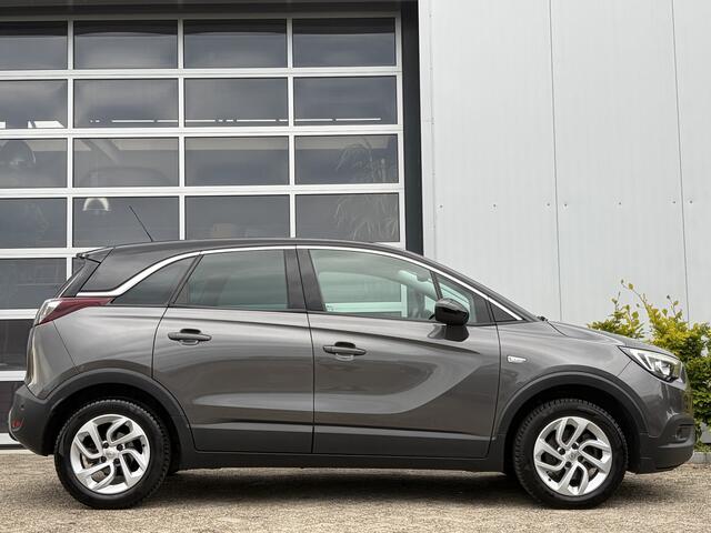 Opel Crossland X 1.2 Turbo Innovation 110pk | Automaat | Nieuwe distributieriem | Achteruitrijcamera | Apple Carplay/Android Auto | Cruise control | Navigatiesysteem full map | Parkeersensor voor en achter | Trekhaak met afneembare kogel | Voorstoelen verwarmd | Zeer nett