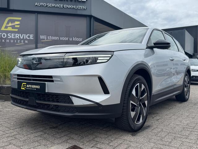 Opel Grandland 1.2 Turbo Hybrid GS Werkelijke nieuwe Grandland met fabrieksgarantie ! | Full LED | Keyless | Navigatie | Carplay draadloos | Verwarmde stoelen en stuurwiel | Draadloos telefoon laden | Camera's | Dikke LMV met all season | 1e eigenaar
