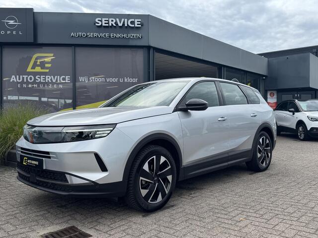 Opel Grandland 1.2 Turbo Hybrid GS Werkelijke nieuwe Grandland met fabrieksgarantie ! | Full LED | Keyless | Navigatie | Carplay draadloos | Verwarmde stoelen en stuurwiel | Draadloos telefoon laden | Camera's | Dikke LMV met all season | 1e eigenaar