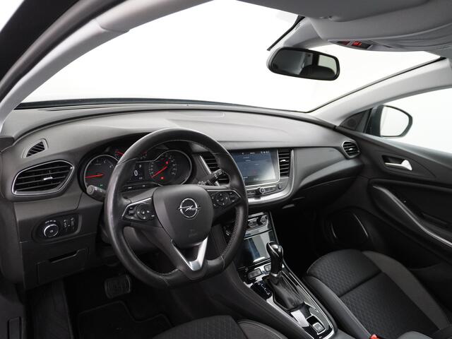 Opel Grandland X T131PK Autom. AGR-Comfort Stoelen Apple Carplay Android Auto Navi Ecc Elek.Achterklep Stuur/Stoelverwarming Cruise Control Pdc Keyless Led Business Executive Regen/Lichtsensor Dodehoeksensor Rijstrooksensor Verkeersbordlezer Winterpakket DAB+ Lmv 18" 1.2 