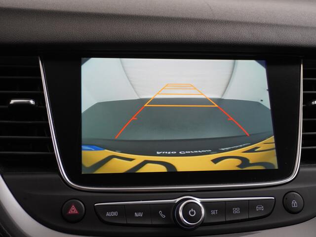 Opel Grandland X T131PK Apple Carplay Android Auto Camera PDC Navi AGR Keyless 19" DAB+ ECC Bluetooth 1/2 Leer Privacy Glas LMVRegen-Licht Sensor Cruise Control Aut.-Achterklep Lane-Assist Leder-Stw Elec-ramen en Spiegels Isofix 100% Dealer Onderhouden Business Executive 