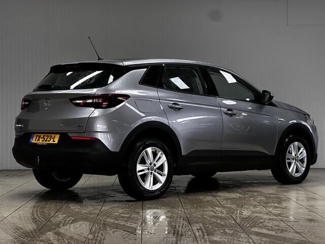 Opel Grandland X 1.2 Turbo Online Edition/ D-Riem verv: 163.000 KM!/ Trekhaak/ 17'' LMV/ Apple + Android/ Airco/ Cruise/ Elek. pakket/ Isofix/ Bluetooth/ Armsteun/ Multi. LEDER. Stuur/ PDC/ LED Dagrijverl.