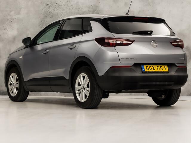 Opel Grandland X 1.2 Turbo Sport (APPLE CARPLAY, NAVIGATIE, GETINT GLAS, CRUISE, SPORTSTOELEN, ARMSTEUN, LM VELGEN, NIEUWE APK, NIEUWSTAAT)